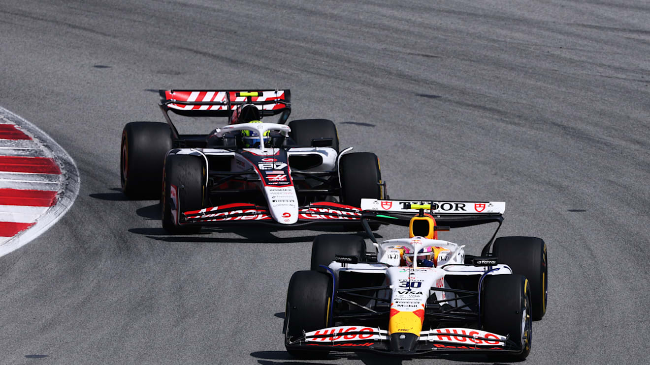 BARCELONA, SPAIN - JUNE 01: Liam Lawson of New Zealand driving the (30) Visa Cash App Racing Bulls VCARB 02 leads Oliver Bearman of Great Britain driving the (87) Haas F1 VF-25 Ferrari on track during the F1 Grand Prix of Spain at Circuit de Barcelona-Catalunya on June 01, 2025 in Barcelona, Spain. (Photo by Clive Rose - Formula 1/Formula 1 via Getty Images)