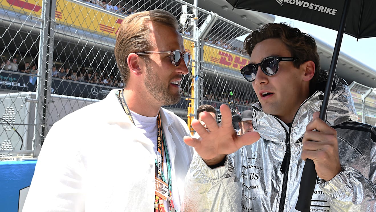 Harry Kane was seen chatting to drivers including George Russell